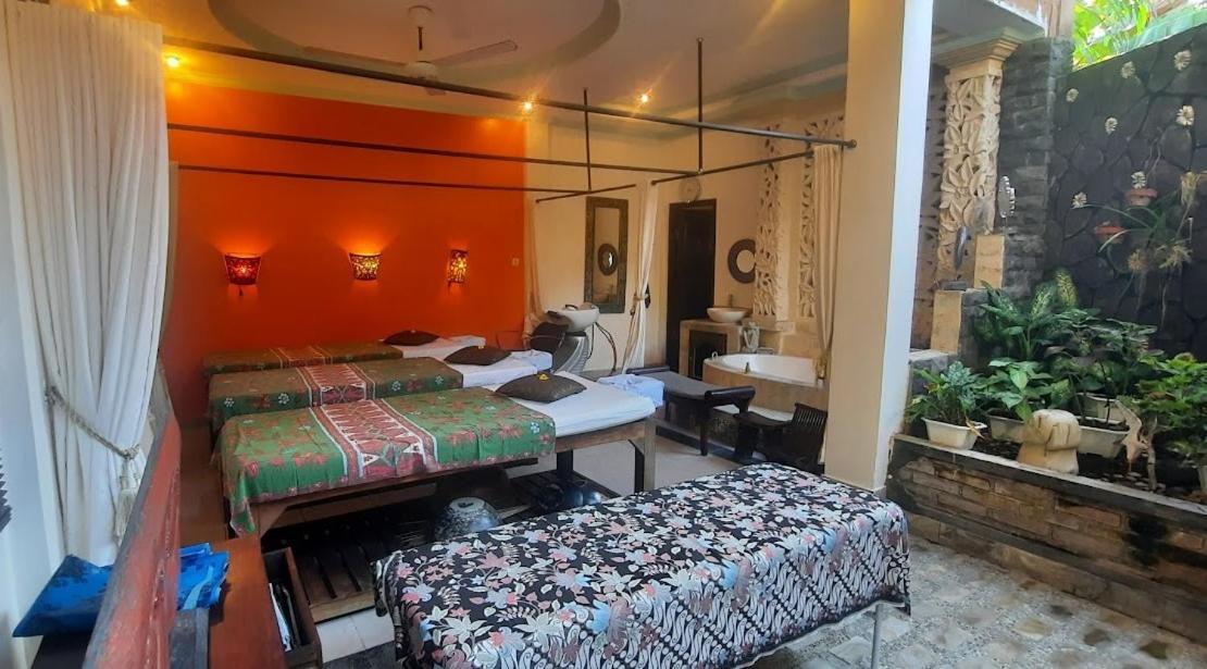 Rambutan Hotel Ловина Экстерьер фото