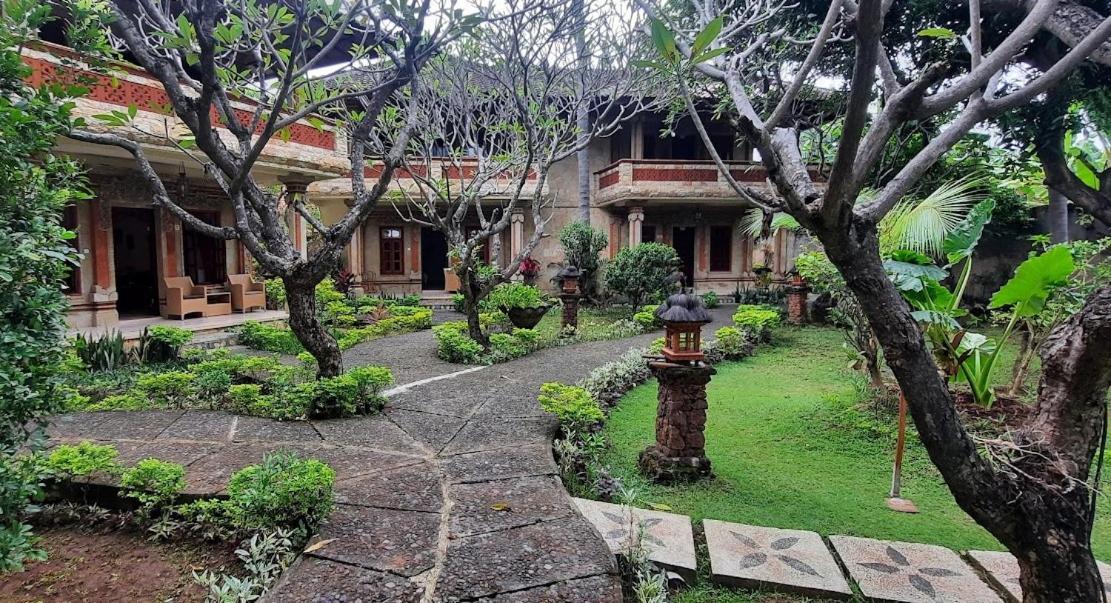 Rambutan Hotel Ловина Экстерьер фото