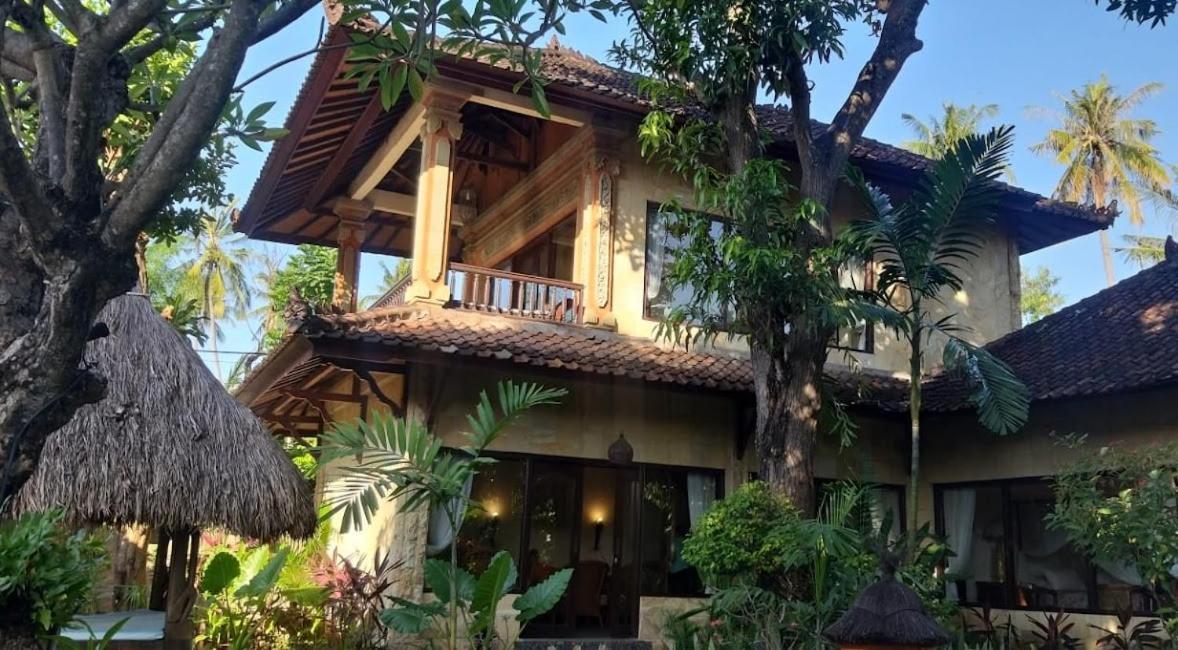 Rambutan Hotel Ловина Экстерьер фото