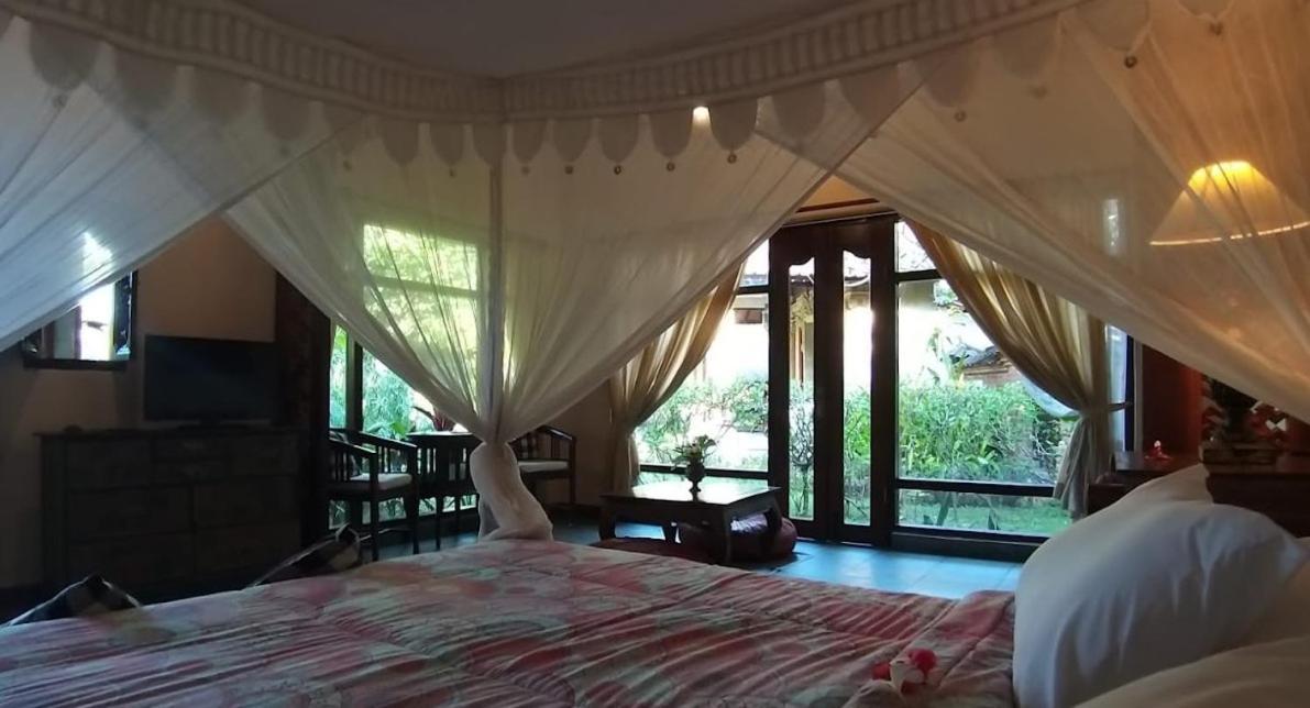 Rambutan Hotel Ловина Экстерьер фото