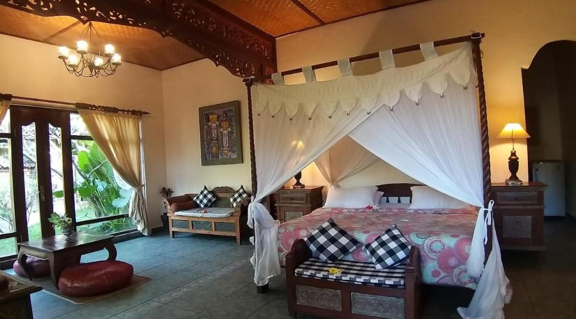 Rambutan Hotel Ловина Экстерьер фото