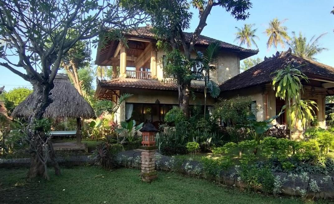 Rambutan Hotel Ловина Экстерьер фото
