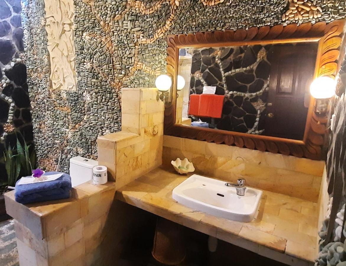Rambutan Hotel Ловина Экстерьер фото