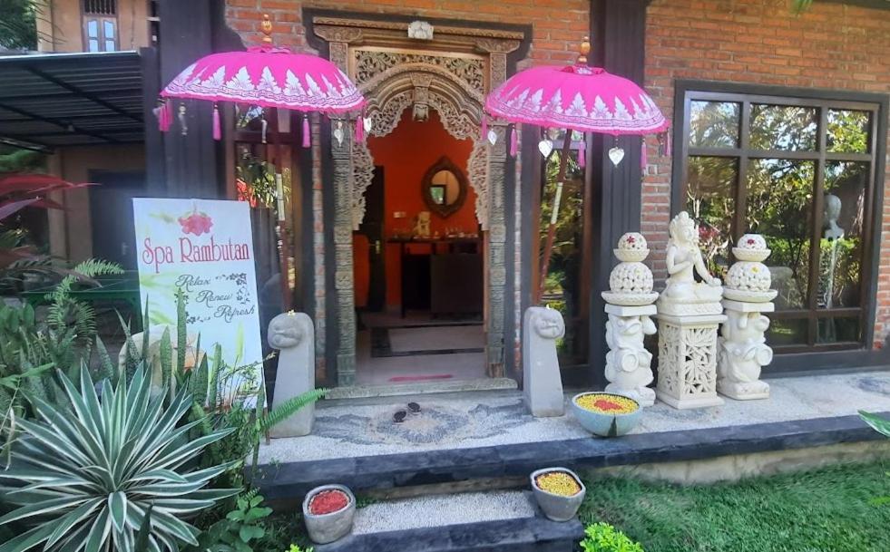 Rambutan Hotel Ловина Экстерьер фото