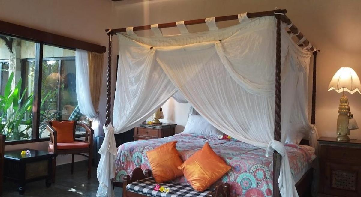 Rambutan Hotel Ловина Экстерьер фото