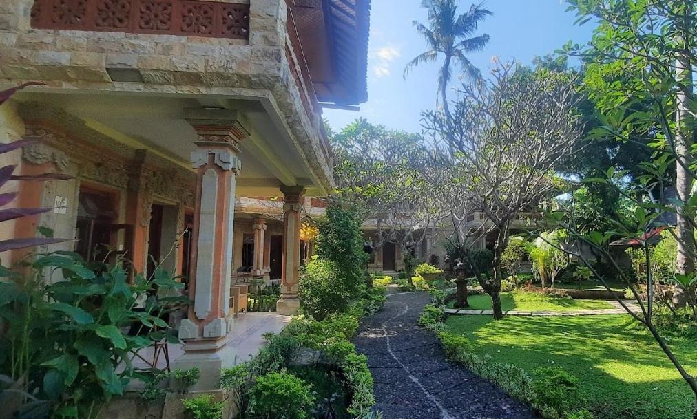 Rambutan Hotel Ловина Экстерьер фото