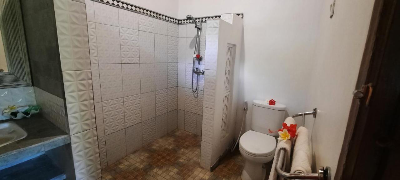 Rambutan Hotel Ловина Экстерьер фото