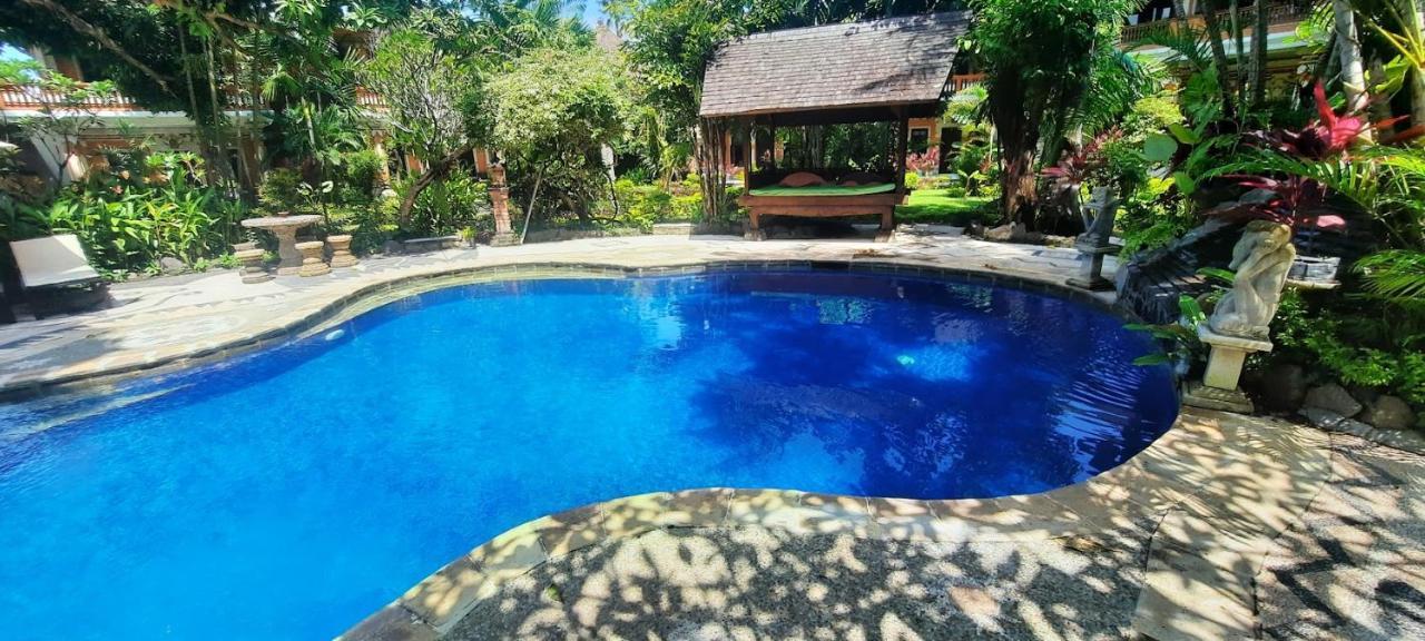 Rambutan Hotel Ловина Экстерьер фото