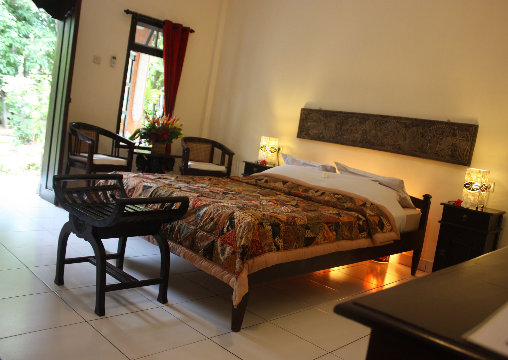 Rambutan Hotel Ловина Экстерьер фото